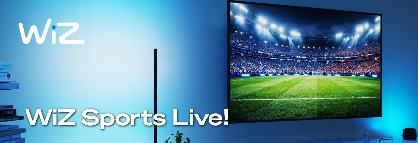 WiZ Sports Live – venner ser fotballstadion fra luften på TV med blå WiZ smart-belysning i stuen